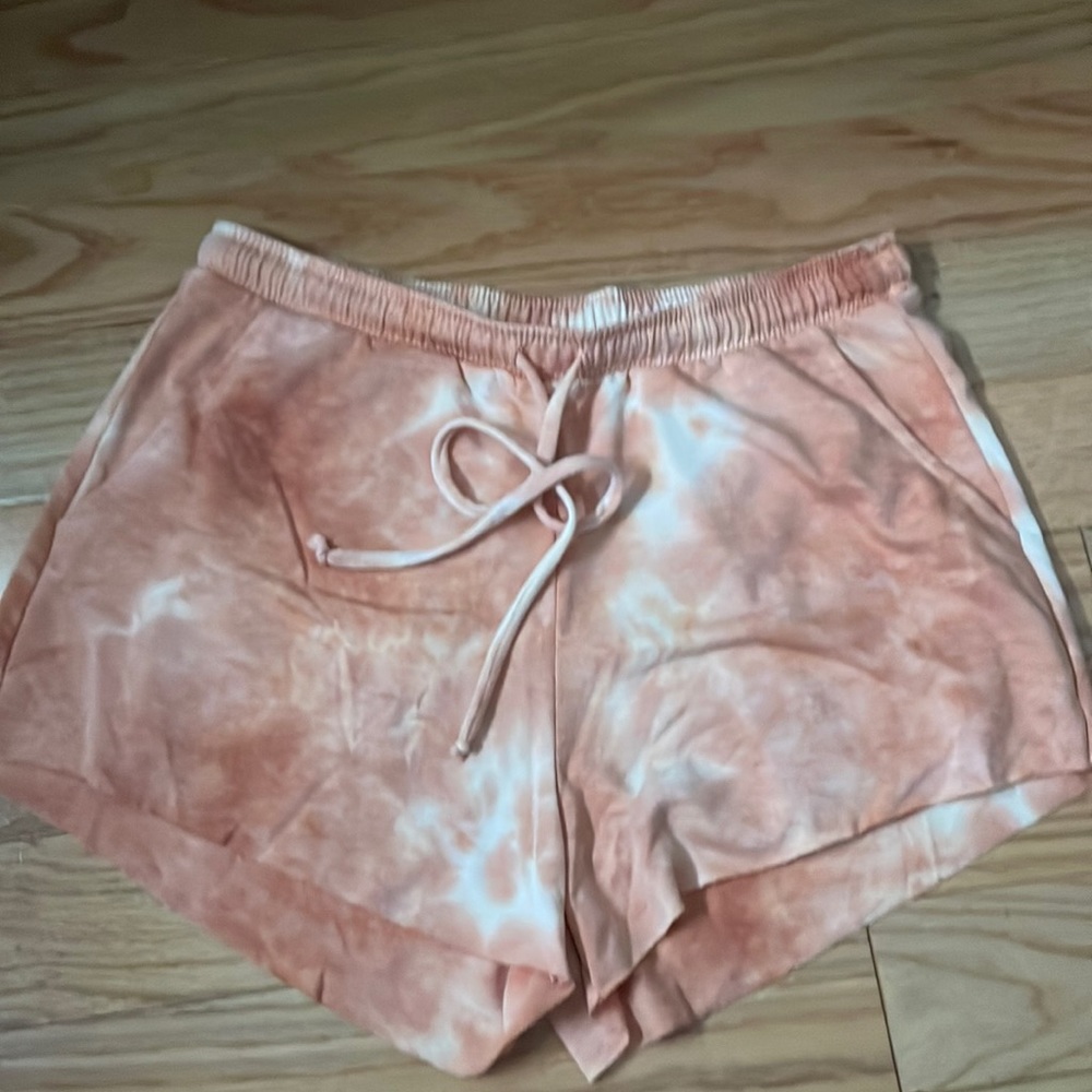 Orange tie-die shorts